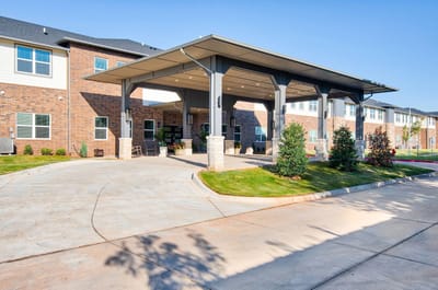 Front entrance of The Carlstone facility with awning