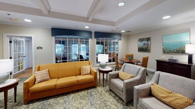 A cozy common area with seating and natural light