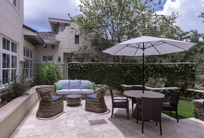 Outdoor seating area with a table and chairs