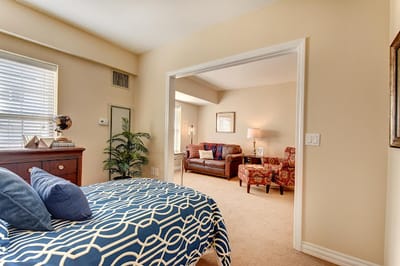 Private resident room with a cozy sitting area