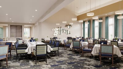 Bright dining area with tables and chairs