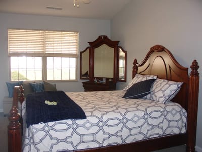 Cozy private bedroom in a senior living facility