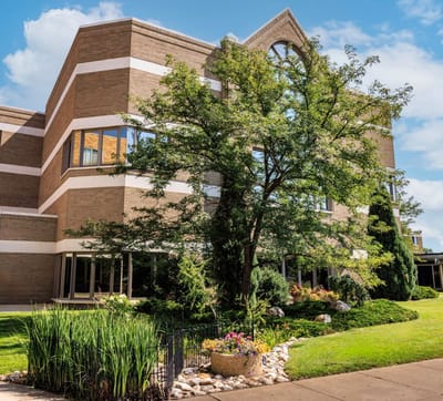 Exterior view of Trinity Homes with landscaping