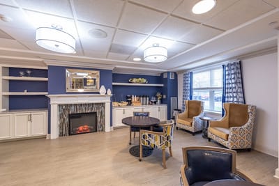 Welcoming common area with seating and fireplace