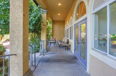 Covered porch area with seating