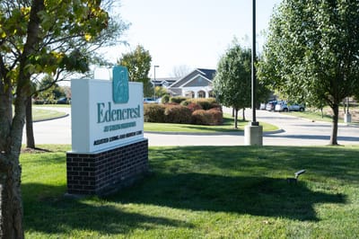 Exterior view of Edencrest facility sign and entrance