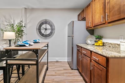 Modern kitchen area with appliances and decor