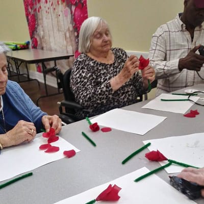 Residents engaged in an arts and crafts activity