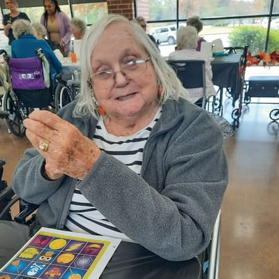 A resident engaging in an activity in a common area