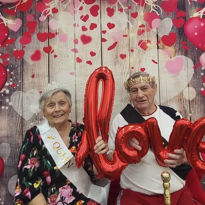 Residents celebrating with decorations and props