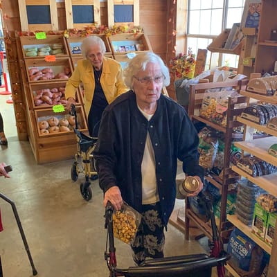 Residents shopping in a facility store
