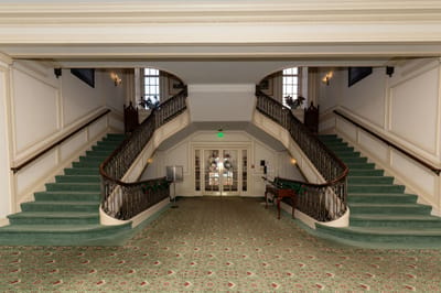 Elegant interior staircase in a retirement facility