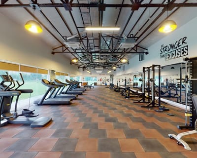 Interior view of a fitness area with gym equipment
