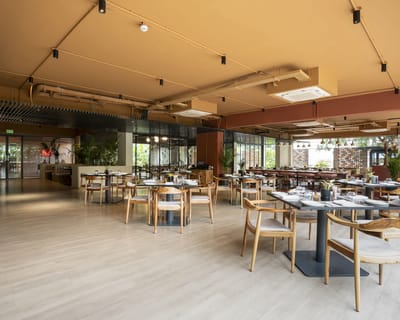 Empty dining area with tables and chairs