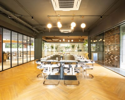 Modern dining room with stylish seating and lighting