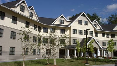 Exterior view of the Cathedral Square building with landscaping