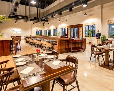 Dining area with tables and chairs in a facility interior