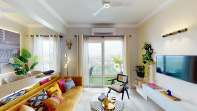 Bright common area with seating and plants