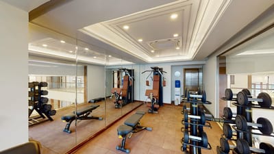 Interior view of a gym area with exercise equipment