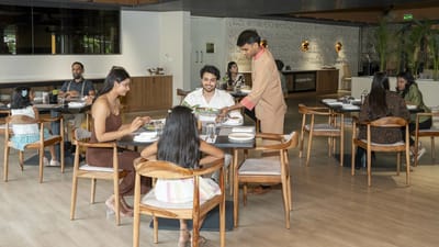 Residents enjoying a meal in a dining area