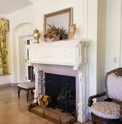 Elegant interior with a fireplace and seating