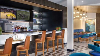 Interior view of a stylish common area with bar seating