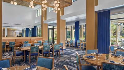 Elegant dining area with well-set tables and decor