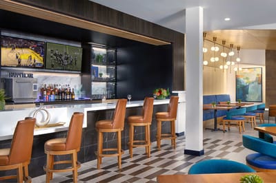 Interior view of a stylish bar area with seating