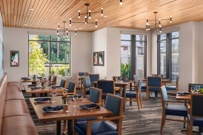 Modern dining room with elegant décor and seating