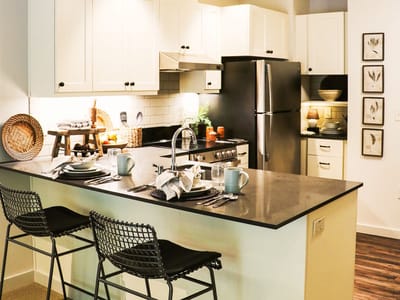 Bright, modern kitchen with dining setup