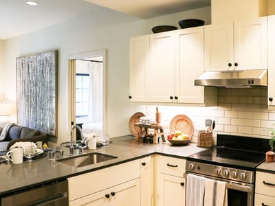 Bright kitchen area with dining and living space