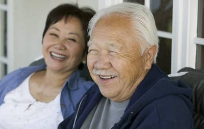 Oakey Assisted Living, nursing home in Las Vegas, NV — Happy seniors enjoying conversation on a porch