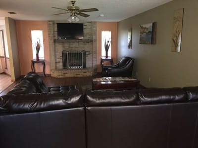 Cozy common area with seating and fireplace