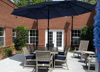 Outdoor seating area with umbrellas and tables