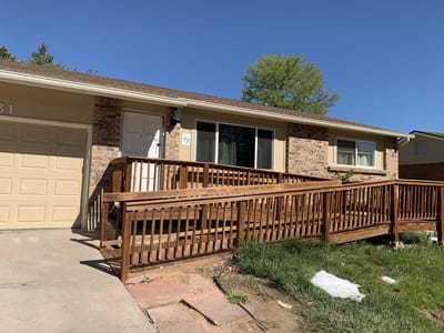 Exterior view of a residential building with a ramp
