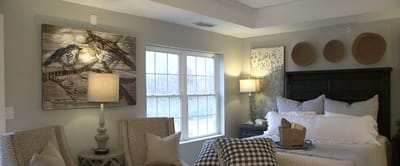 Cozy resident room with comfortable furniture and decor