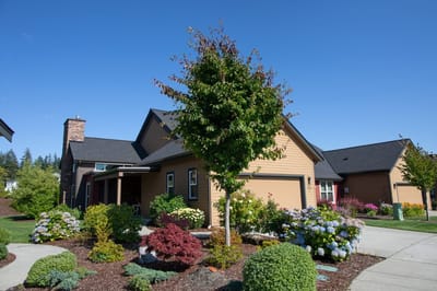 Exterior view of a residential-style building with landscaping