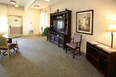 Cozy common area with a television and seating