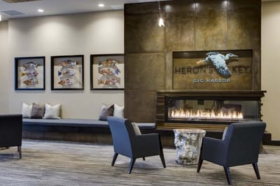Cozy interior lobby area with seating and fireplace