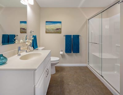 Bright, clean bathroom with modern amenities