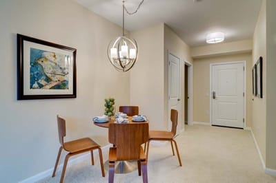 Cozy dining area in a resident's room with decor