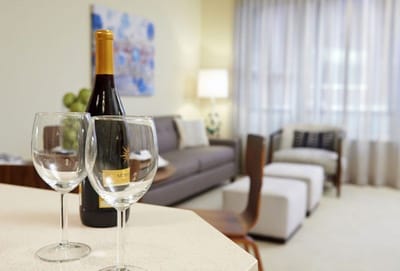 Interior view of a living space with wine glasses