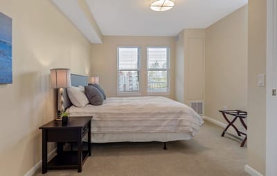 Comfortable private resident room with bed and furnishings