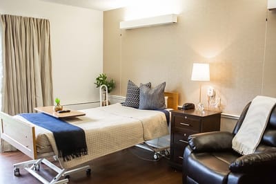 Cozy private room in a nursing facility.