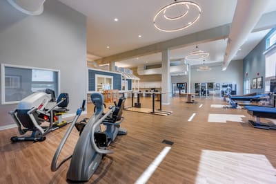 Interior view of a fitness area with equipment.