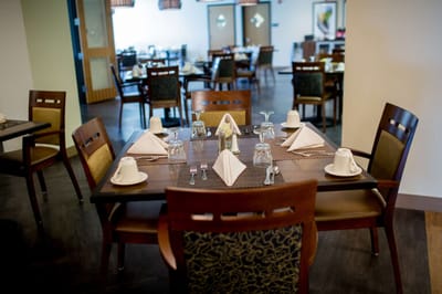 Dining area set with neatly arranged tables