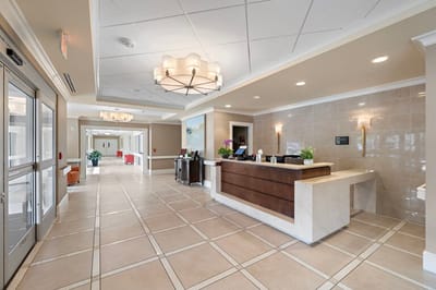 Bright interior lobby with reception area.