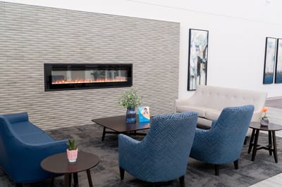 Interior lounge area with seating and fireplace
