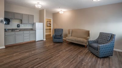 Comfortable lounge area with seating and kitchenette