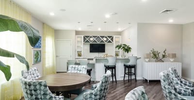Bright common area with modern seating and decor